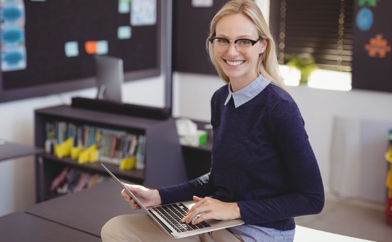 sc happy-teacher- computer 550 | MiddleWeb